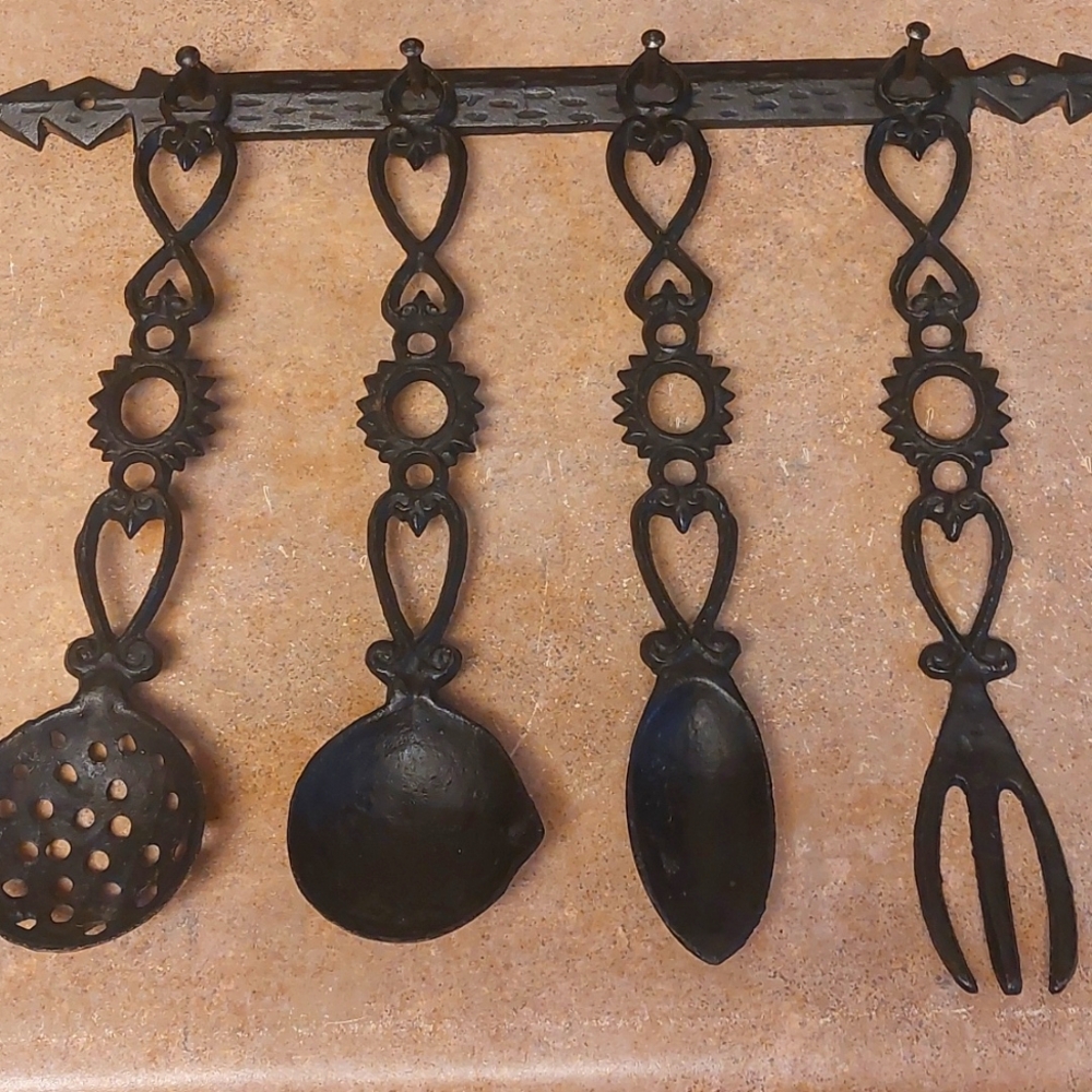 Vintage Tiaman cast iron 5pc hanging utensil rack. Amazing condition.